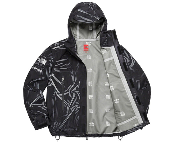 SUPREME THE NORTH FACE TROMPE L' OEIL PRINTED TAPE SEAM SHELL JACKET