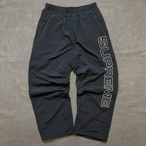 SUPREME SPELLOUT EMBROIDERED TRACK PANT