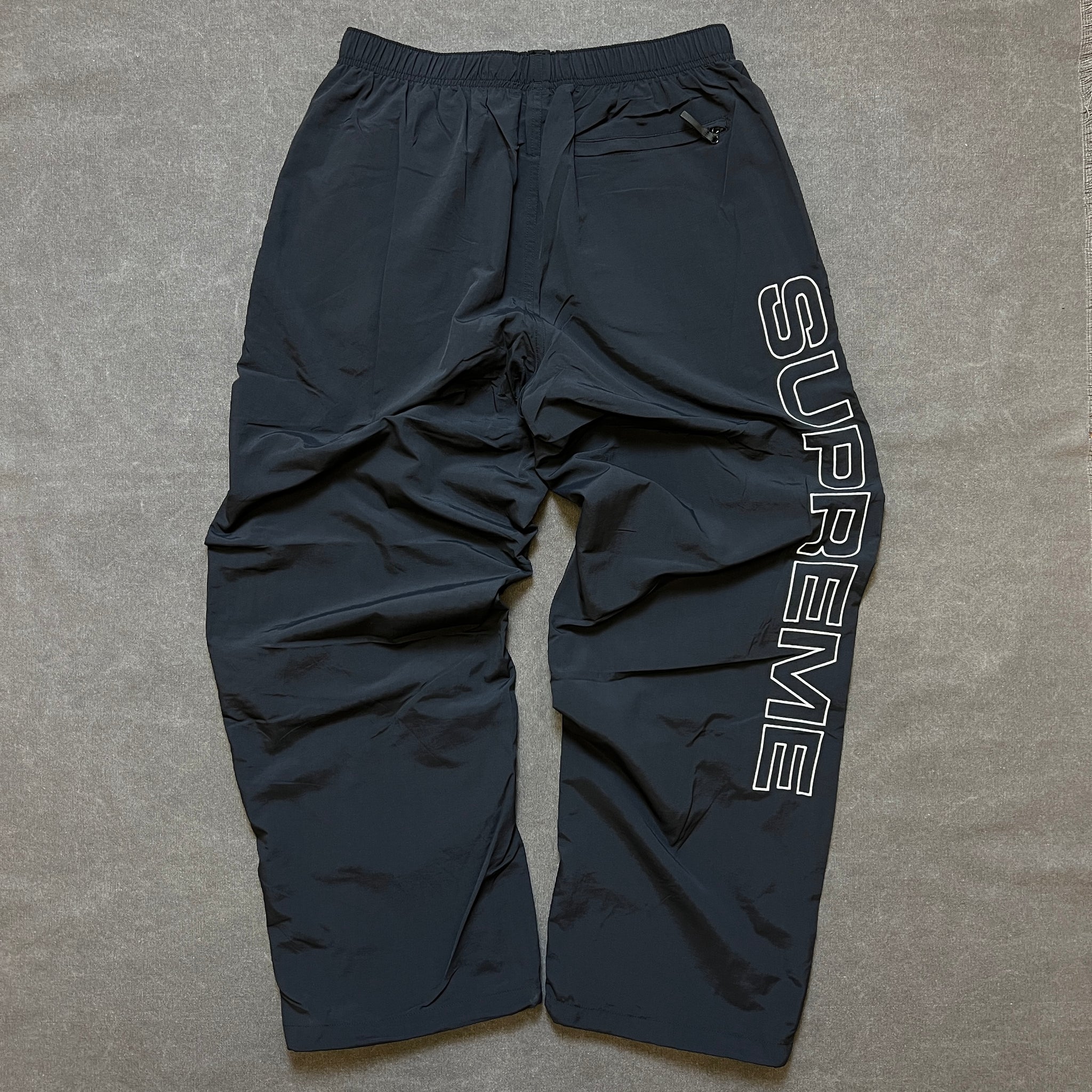 SUPREME SPELLOUT EMBROIDERED TRACK PANT – Trade Point_HK
