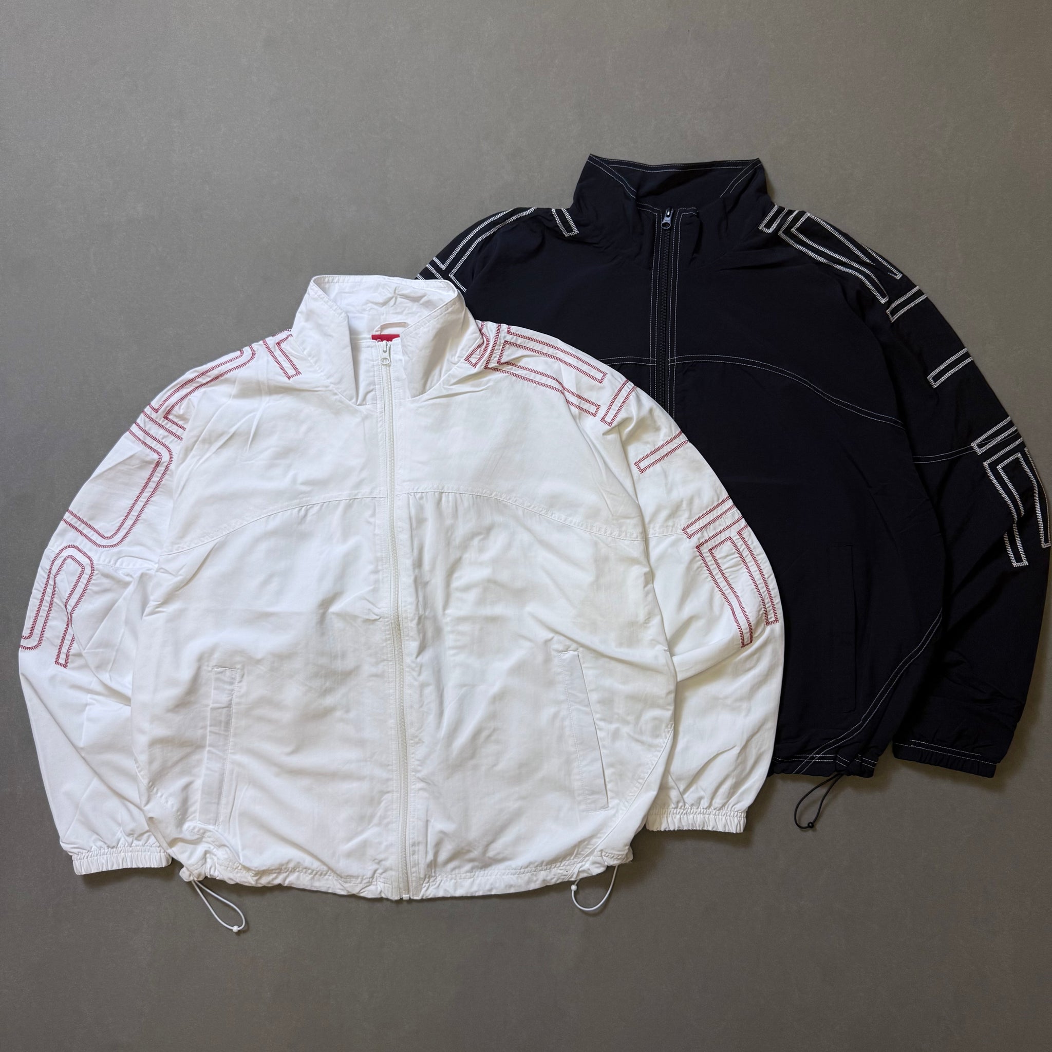 SUPREME SPELLOUT EMBROIDERED TRACK JACKET