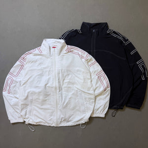 SUPREME SPELLOUT EMBROIDERED TRACK JACKET