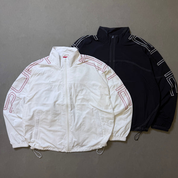 SUPREME SPELLOUT EMBROIDERED TRACK JACKET