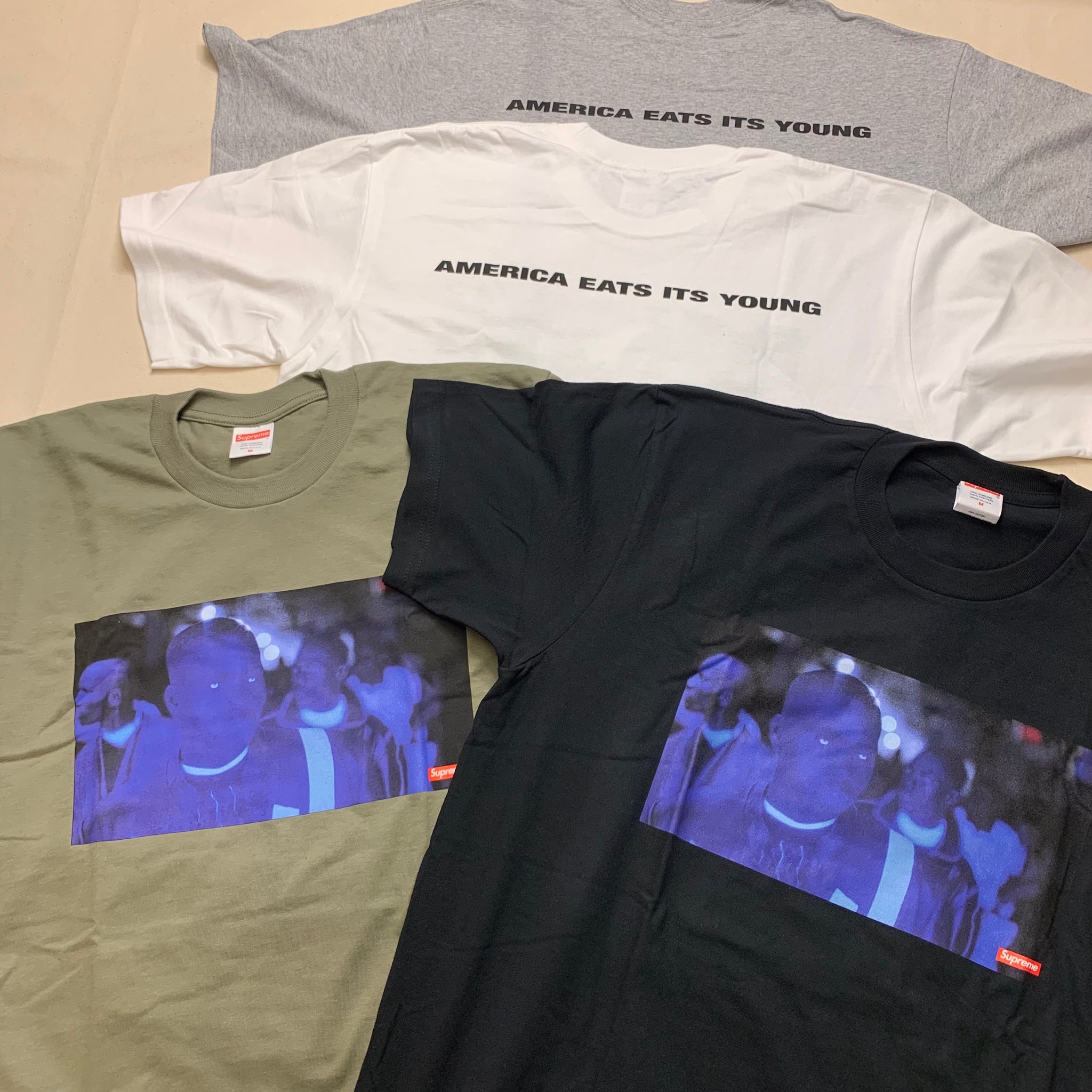 SUPREME AMERICA EATS ITS YOUNG TEE – Trade Point_HK