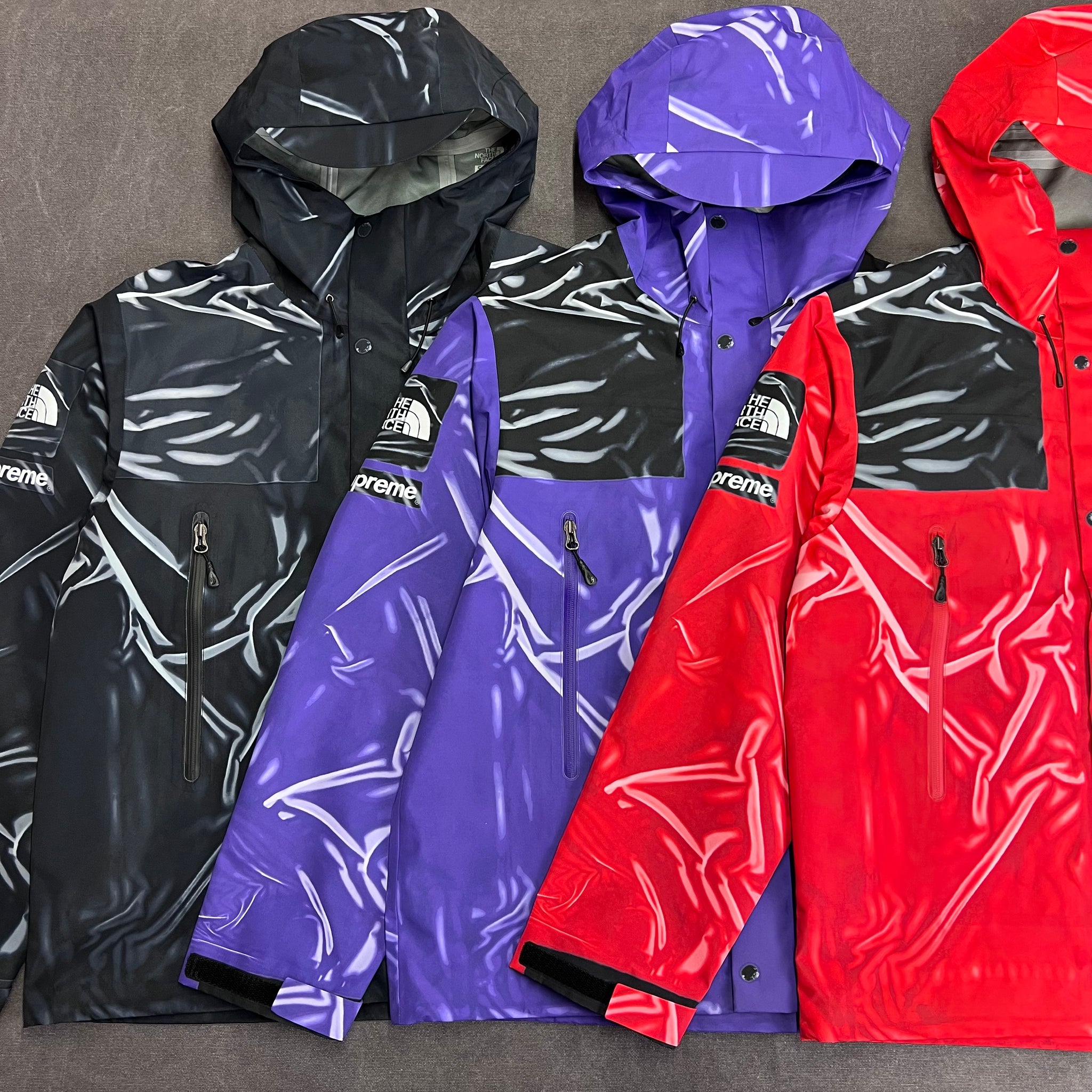 SUPREME THE NORTH FACE TROMPE L' OEIL PRINTED TAPE SEAM SHELL JACKET