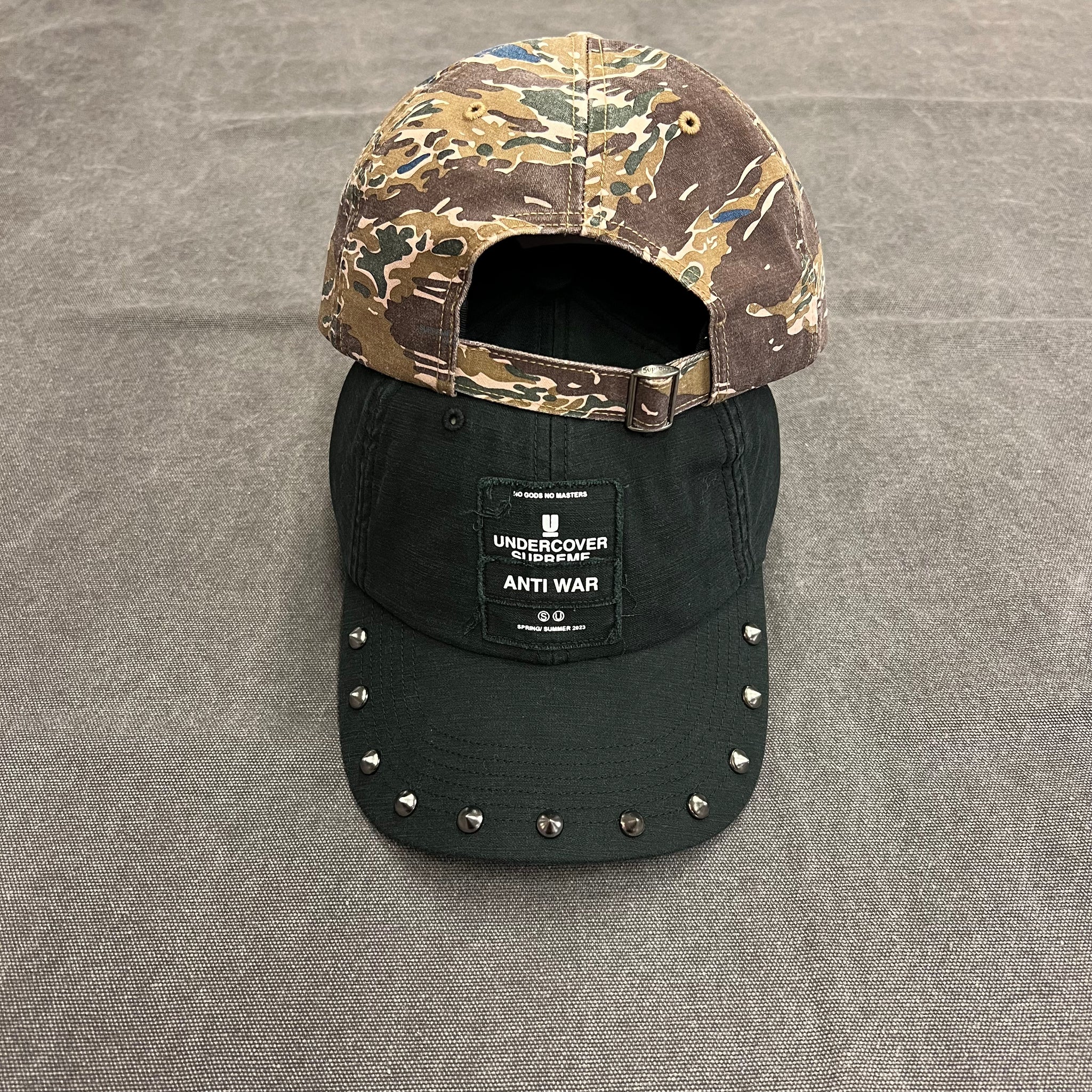 SUPREME UNDERCOVER STUDDED 6 PANEL